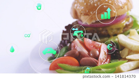 Showing white plate with sesame-seed burger, salad, fries on white tabletop, with teal metric icons Showing white plate with sesame-seed burger, salad, fries on white tabletop, with teal metric icons 141814370