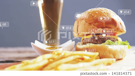 Showing cheeseburger on board with fries, dipping bowl, drink, notification overlays, copy space Showing cheeseburger on board with fries, dipping bowl, drink, notification overlays, copy space 141814371