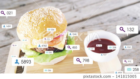 Showing sesame bun burger with lettuce, beef patty, cheese, onion and sauce on board, digital tags Showing sesame bun burger with lettuce, beef patty, cheese, onion and sauce on board, digital tags 141815005