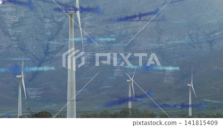 Spinning central white wind turbine showing waveform code overlays above plain at rocky foothills Spinning central white wind turbine showing waveform code overlays above plain at rocky foothills 141815409