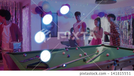 Dominating pool table sitting in rec room, with cues, birthday banner, guests in casual clothes Dominating pool table sitting in rec room, with cues, birthday banner, guests in casual clothes 141815551