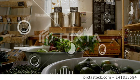 Showing large metal bowls holding avocados, greens and roots at market stall, with AR overlays Showing large metal bowls holding avocados, greens and roots at market stall, with AR overlays 141815584