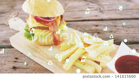 Featuring cheeseburger and seasoned fries on wooden board at cafe table, turquoise UI icons Featuring cheeseburger and seasoned fries on wooden board at cafe table, turquoise UI icons 141815600