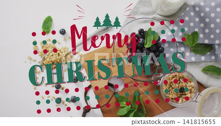 Displaying Merry Christmas overlay covering central white tabletop, with cutting board, blueberries 141815655