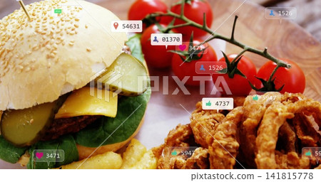 Showcasing sesame-burger pickles-cheese skewer left on wood board with fries, rings and social tags Showcasing sesame-burger pickles-cheese skewer left on wood board with fries, rings and social tags 141815778