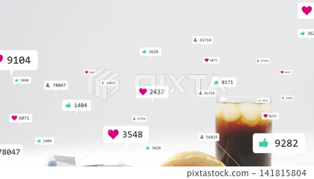 Featuring tall glass with ice on tabletop surface, pastry and napkin, reaction tags, copy space Featuring tall glass with ice on tabletop surface, pastry and napkin, reaction tags, copy space 141815804