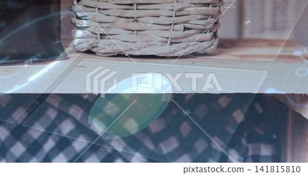 Showing woven wicker basket on tabletop, with grid mat, disc, dark fabric, leather case, overlay Showing woven wicker basket on tabletop, with grid mat, disc, dark fabric, leather case, overlay 141815810