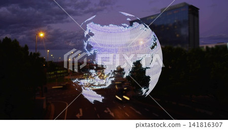 Hovering translucent globe hologram showing Asia above multi-lane road at dusk, with streetlights Hovering translucent globe hologram showing Asia above multi-lane road at dusk, with streetlights 141816307