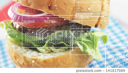Displaying stacked burger on blue-white gingham cloth, showing HUD overlays and numeric readouts Displaying stacked burger on blue-white gingham cloth, showing HUD overlays and numeric readouts 141817089