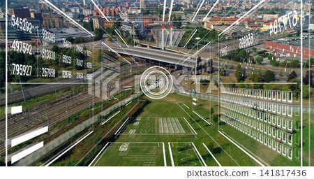 Displaying aerial city view of highway overpass with ramps, rail tracks, grassy marked field HUD Displaying aerial city view of highway overpass with ramps, rail tracks, grassy marked field HUD 141817436