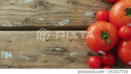 Showing large tomato with green calyx, cherry tomatoes, droplets on wood, blue numbers, copy space Showing large tomato with green calyx, cherry tomatoes, droplets on wood, blue numbers, copy space 141817716