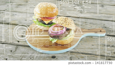 Displaying two hamburgers with sesame and seeded buns on round wooden board, showing AR overlays 141817730