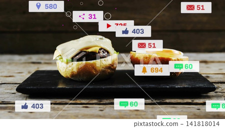 Displaying two rolls with melted cheese, leaf and yolk on black slate at rustic table, badges Displaying two rolls with melted cheese, leaf and yolk on black slate at rustic table, badges 141818014