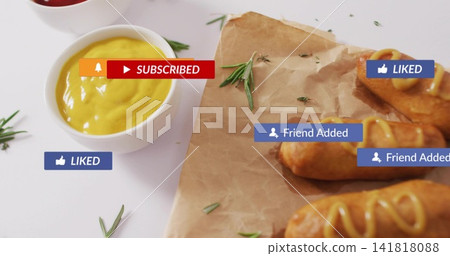 Displaying fried skewered snacks drizzling mustard on white tabletop, with social badges 141818088