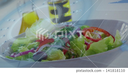 Showing white shallow salad bowl on table, featuring lettuce and tomato with oil bottle overlays Showing white shallow salad bowl on table, featuring lettuce and tomato with oil bottle overlays 141818110