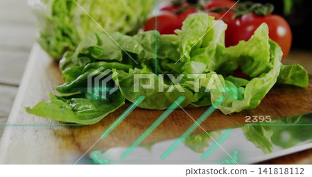Scanning butterhead lettuce showing veins on kitchen board, with knife, cherry tomatoes, HUD 2395 Scanning butterhead lettuce showing veins on kitchen board, with knife, cherry tomatoes, HUD 2395 141818112