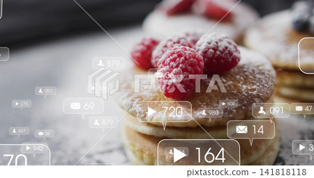 Showing pancake stack sitting on dark slate, featuring raspberries sugar dusting and overlay icons Showing pancake stack sitting on dark slate, featuring raspberries sugar dusting and overlay icons 141818118