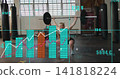 Squatting female lifter in sports bra and shorts holding Olympic barbell at gym, showing AR data 141818224