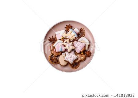 Gingerbread as a Christmas staple, sweet biscuits for the holiday. Gingerbread as a background 141818922