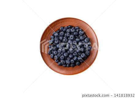 Fresh, ripe, and juicy wild blueberries as an ingredient for vegetarian dishes Fresh, ripe, and juicy wild blueberries as an ingredient for vegetarian dishes 141818932