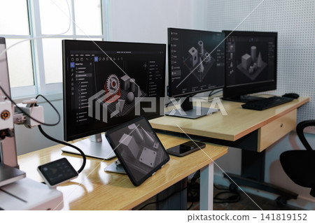 Modern workstation with multiple monitors 3d modeling software in an office lab Modern workstation with multiple monitors 3d modeling software in an office lab 141819152