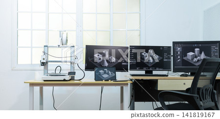 Modern design workspace with 3d printer, computer monitors and tablet digital models in a bright office Modern design workspace with 3d printer, computer monitors and tablet digital models in a bright office 141819167