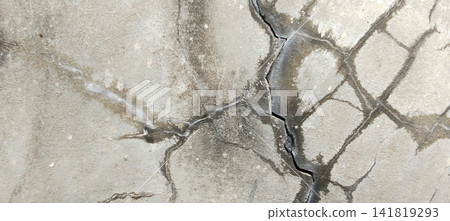 Deep cracks and water seepage stains on the concrete wall. Deep cracks and water seepage stains on the concrete wall. 141819293