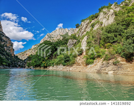 Boat trip on turquoise water of mountain canyon, Verdon Gorge in french Alps, Provence France. Boat trip on turquoise water of mountain canyon, Verdon Gorge in french Alps, Provence France. 141819892