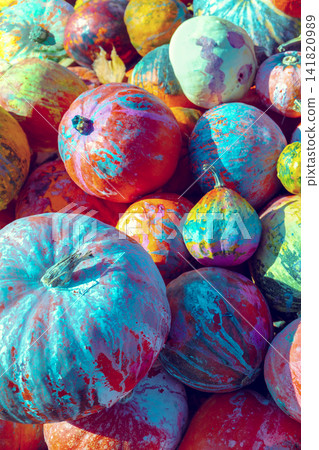 Full frame background of Pumpkins. Many Pumpkins on the grass. Autumn background. Halloween, Thanksgiving, Autumn, Harvest background. Vertical banner Full frame background of Pumpkins. Many Pumpkins on the grass. Autumn background. Halloween, Thanksgiving, Autumn, Harvest background. Vertical banner 141820989