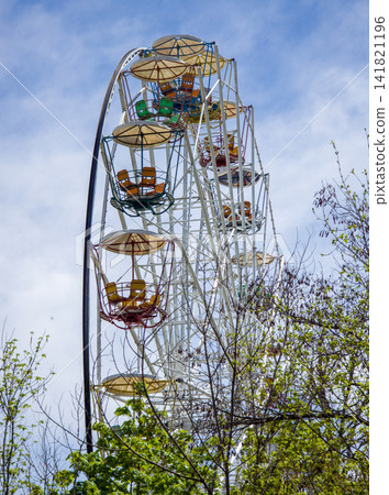 Tall carnival ride with rotating seats Tall carnival ride with rotating seats 141821196