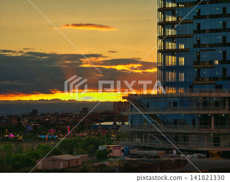 Sunset view of modern high-rise building and cityscape Sunset view of modern high-rise building and cityscape 141821330