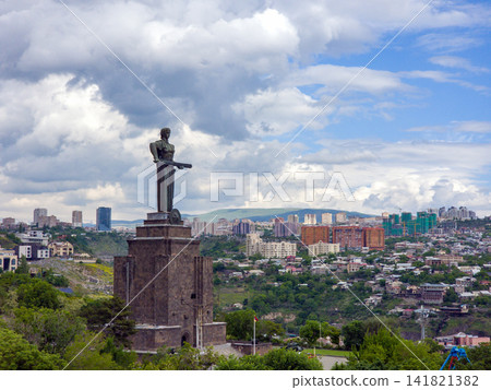 Mother Armenia Monument overlooks city from elevated hillside Mother Armenia Monument overlooks city from elevated hillside 141821382