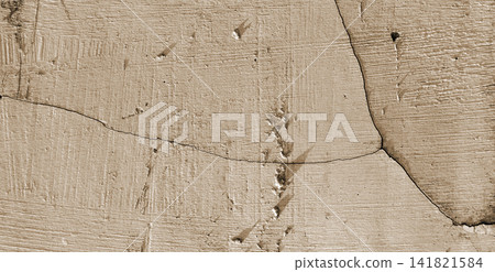Scratched and cracked sepia plaster surface 141821584