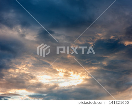 Sky scene with textured clouds illuminated by sunset Sky scene with textured clouds illuminated by sunset 141821600