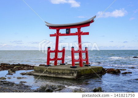 The sea gate of Konpira Shrine, standing in the Sea of Japan, in Hatsuyama Village, Hokkaido. The sea gate of Konpira Shrine, standing in the Sea of Japan, in Hatsuyama Village, Hokkaido. 141821750
