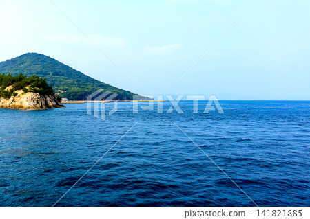 [Kagawa] Summer view of Ogijima Island from Meon ferry heading to Megijima Island. 141821885
