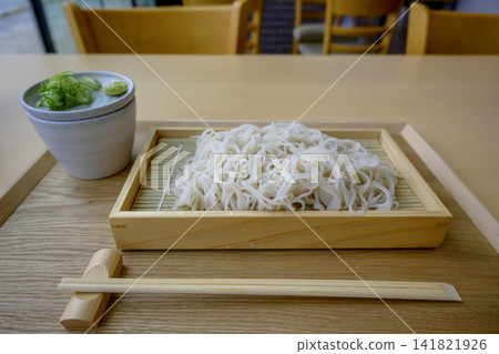 Sarashina soba (served in a bowl of mori soba) - a traditional Japanese soba dish. Sarashina soba (served in a bowl of mori soba) - a traditional Japanese soba dish. 141821926
