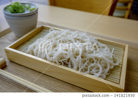 Sarashina soba (served in a bowl of mori soba) - a traditional Japanese soba dish. Sarashina soba (served in a bowl of mori soba) - a traditional Japanese soba dish. 141821930