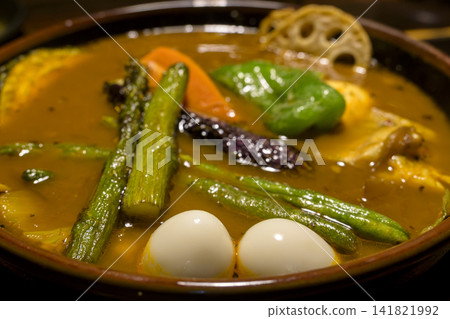 Hokkaido specialty: Colorful vegetable and chicken soup curry Hokkaido specialty: Colorful vegetable and chicken soup curry 141821992
