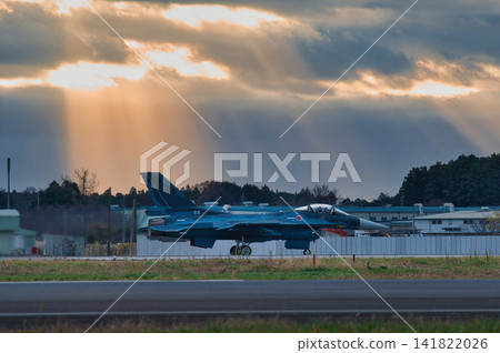 Fighter jets taking off with the rising sun in the background. Fighter jets taking off with the rising sun in the background. 141822026
