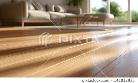 Warm sunlight falling on polished hardwood floor in living room Warm sunlight falling on polished hardwood floor in living room 141822983