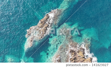 Drone aerial footage showing the Shakotan Blue sea and Cape Kamui from above (Shakotan Town, Hokkaido) Drone aerial footage showing the Shakotan Blue sea and Cape Kamui from above (Shakotan Town, Hokkaido) 141823027