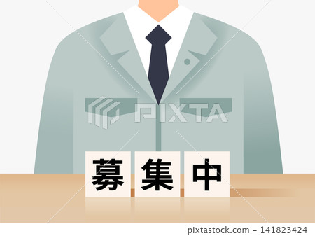 尋找一位身穿工作服、手持積木的男士。 141823424