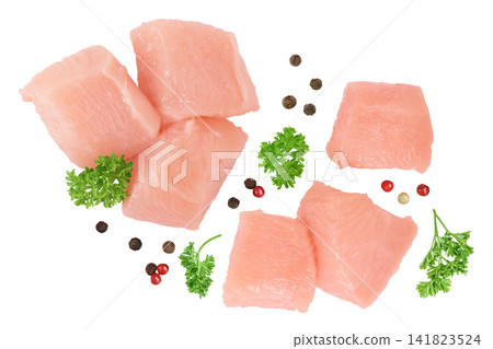 Raw diced chicken fillet isolated on white background. Top view. Flat lay Raw diced chicken fillet isolated on white background. Top view. Flat lay 141823524