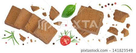 Brown cheese. Norwegian brunost isolated on white background. Top view. Flat lay Brown cheese. Norwegian brunost isolated on white background. Top view. Flat lay 141823549