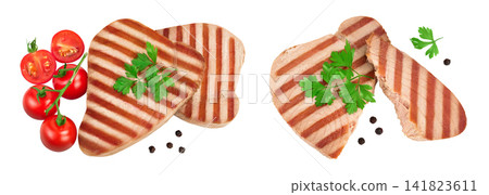 Tuna fish steak grilled isolated on white background with full depth of field, Top view. Flat lay Tuna fish steak grilled isolated on white background with full depth of field, Top view. Flat lay 141823611
