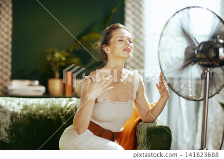 Woman Overheated Seeking Relief from Summer Heat Woman Overheated Seeking Relief from Summer Heat 141823688