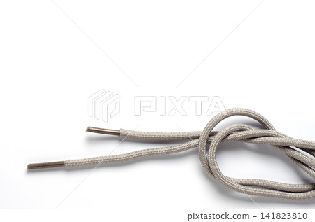 Shoelace on a white background. Copy space Shoelace on a white background. Copy space 141823810