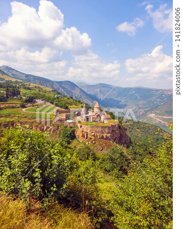 Panoramic view of old Tatev monastery on mountain ridge Panoramic view of old Tatev monastery on mountain ridge 141824006