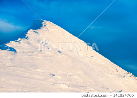 Mountain peak in snow Mountain peak in snow 141824700